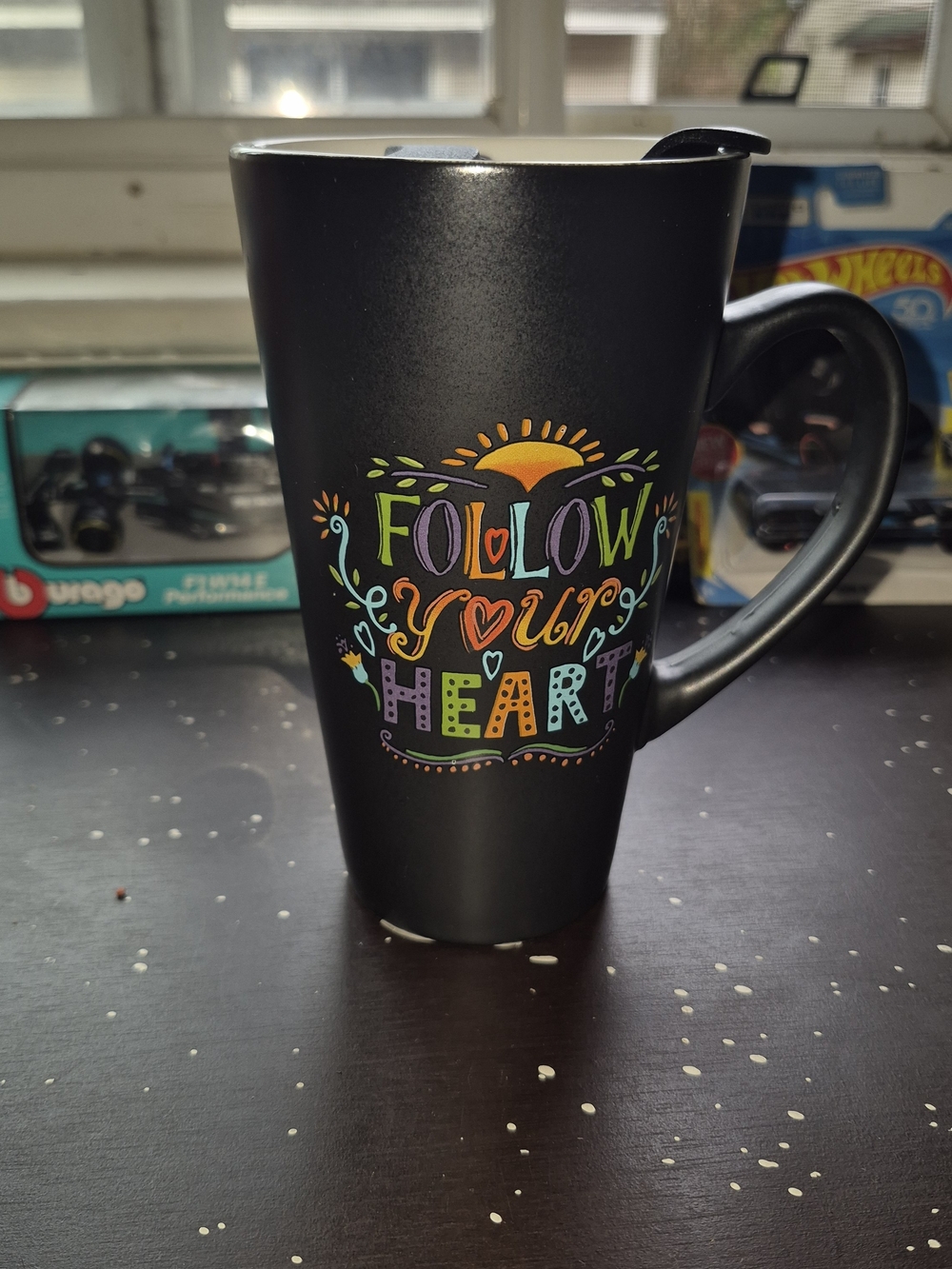 Kohl's Black Travel Mug with Colorful 'Follow Your Heart' Lettering